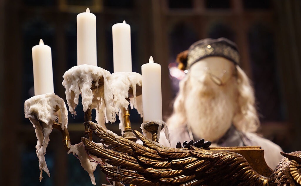 Candles in front of Dumbledore's costume at Warner Bros. Studio Tour London