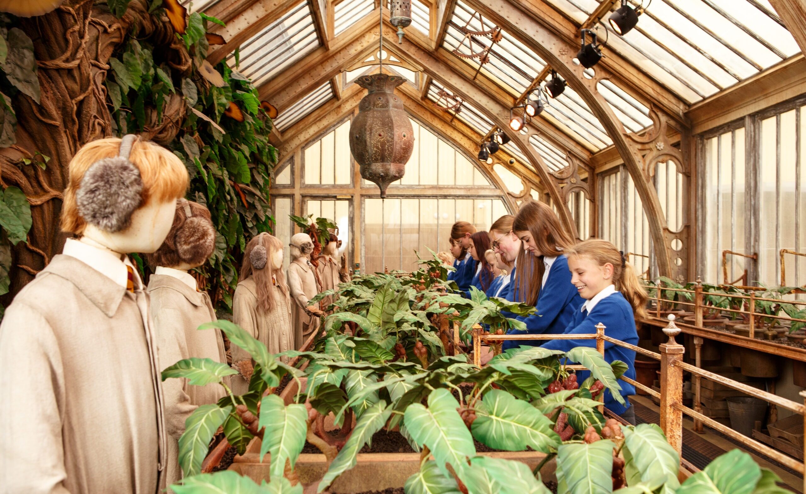 A school group in Professor Sprout's Greenhouse